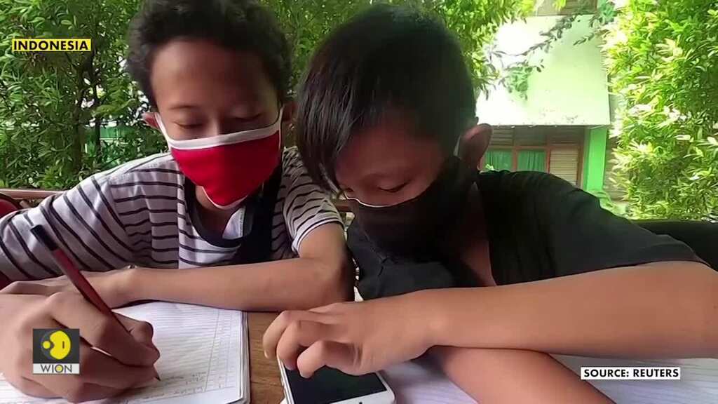 Starved of wifi, Indonesian students trade plastic trash to study online