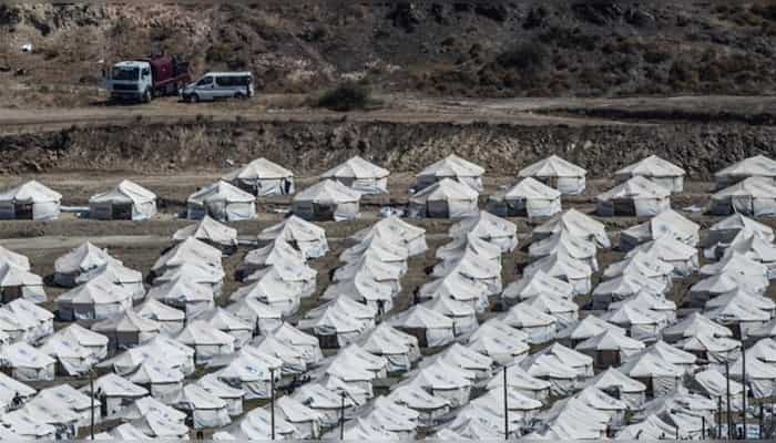 Police move refugees to new Lesbos camp after Moria fire
