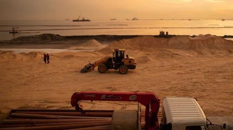 Polluted stretch of Manila Bay gets fake white sand makeover Polluted stretch of Manila Bay gets fake white sand makeover