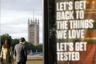 Britain introduces new travel measures as Omicron cases rise to 160