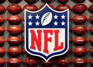 NFL fines teams, coaches for failing to wear masks properly during games