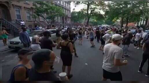Social-distance block party continues in New York amid pandemic