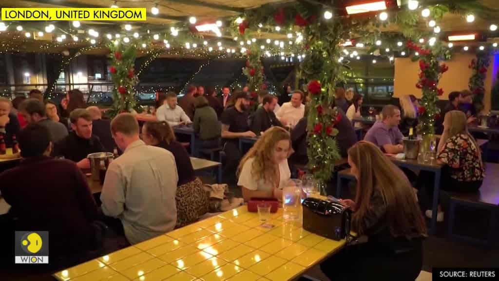 British bars and pubs adapt to new coronavirus rules