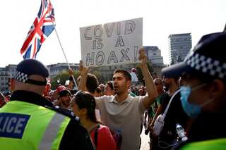British police seek to break up anti-lockdown protest in London