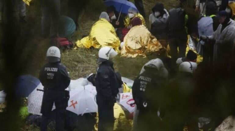 Anti-coal environmentalists stage protests around western mine in Germany