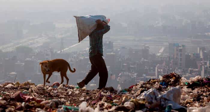 Rescuers dig through Indian trash dump for 12-year-old 'rag picker' Rescuers dig through Indian trash dump for 12-year-old 'rag picker'