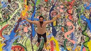 British artist is painting world's largest canvas to raise money for children's charities