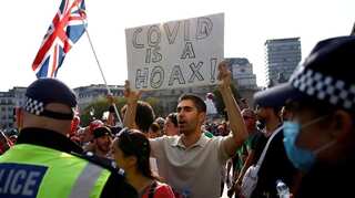 As countries eye reimposition of lockdowns, protesters swarm the streets