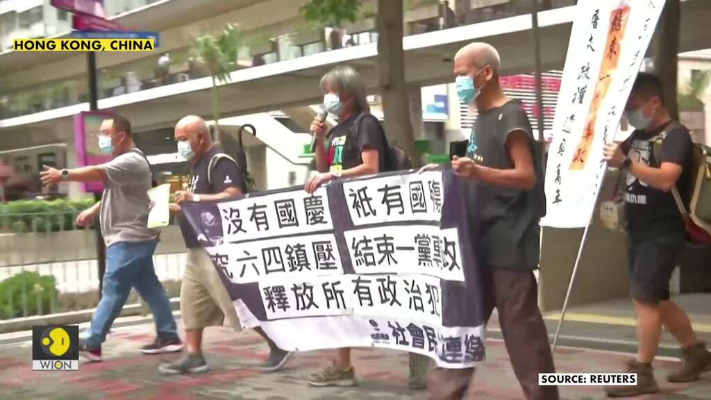 Hong Kong protesters call for release of political prisoners as city celebrates national day