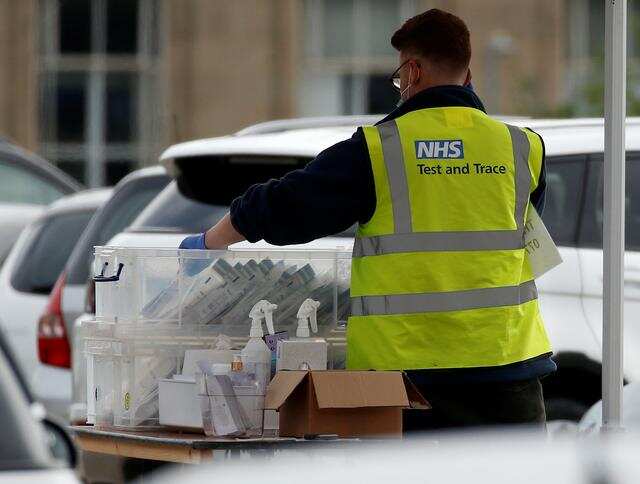 Britain opens investigation into coronavirus test and trace glitch