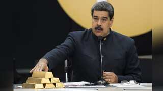 Faced with political unrest and US sanctions, Venezuela’s Maduro plays Christmas card
