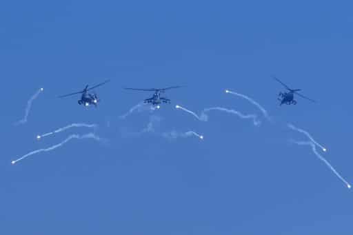 Helicopters fire away