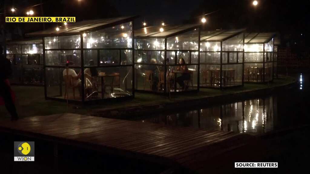 Brazil restaurant installs glass cabins to shield diners from virus