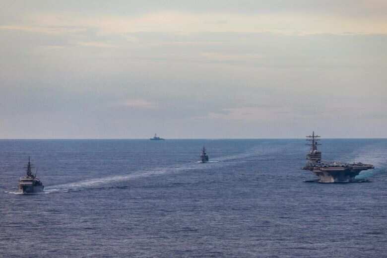 Stop incursion and immediately recall boats, Philippines tells China on South China Sea row