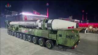 North Korea unveils giant ICBM during pre-dawn military parade