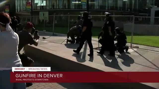 Man shot dead at dueling Denver protests, suspect in custody