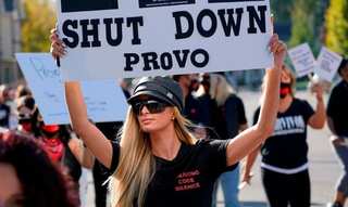 Paris Hilton leads protests outside the school where she was abused, calls for closure