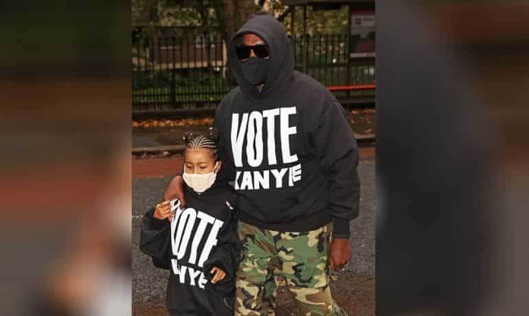 Kanye West and daughter North sport 'Vote Kanye' shirts at London fashion show Kanye West and daughter North sport 'Vote Kanye' shirts at London fashion show