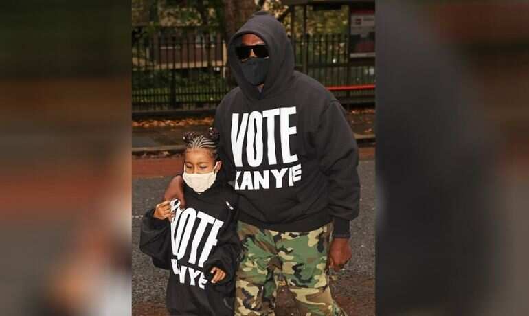 Kanye West and daughter North sport 'Vote Kanye' shirts at London fashion show