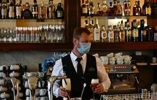 German bars, restaurants placed under evening restrictions amid surge in virus cases