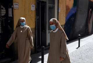 Spain imposes new restrictions in Catalonia amid virus surge in Europe