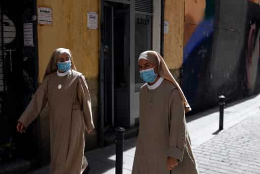 Spain imposes new restrictions in Catalonia amid virus surge in Europe