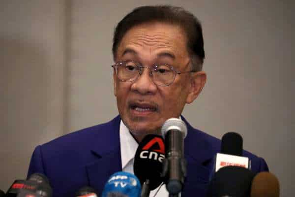 Malaysia's Anwar submits documents to king to show support to form new government