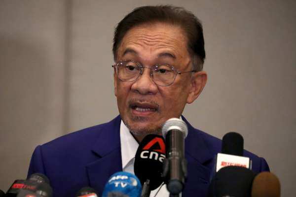 Malaysia's Anwar submits documents to king to show support to form new government
