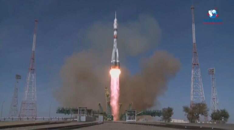 Three astronauts dock at ISS within three hours of launch
