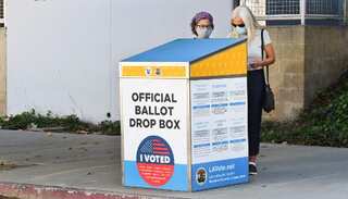 In record turnout, over 16 million Americans vote ahead of election day on November 3