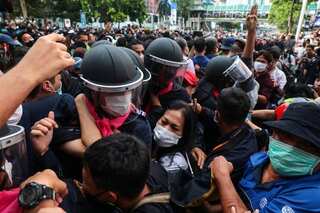 Thousands protest in Bangkok, defy Thai government's emergency decree
