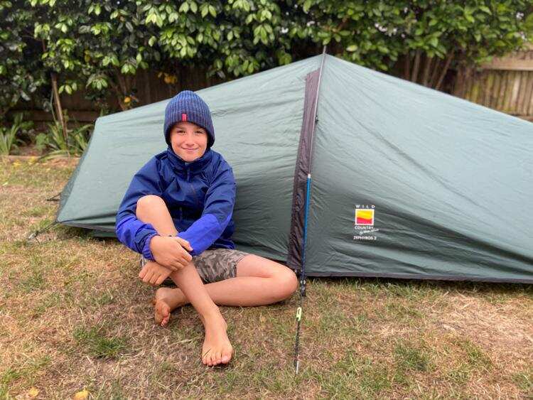 British boy Max Woosey sleeps in tent for charity