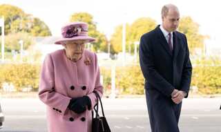 Queen Elizabeth and Prince William draw criticism for not wearing a mask at a public gathering