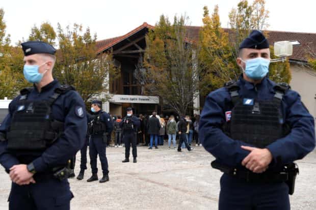 French police raid Islamist groups after teacher's beheading French police raid Islamist groups after teacher's beheading