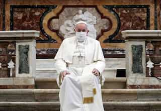 Pope wears mask for first time at public service