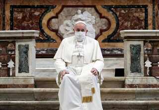 Pope wears mask for first time at public service