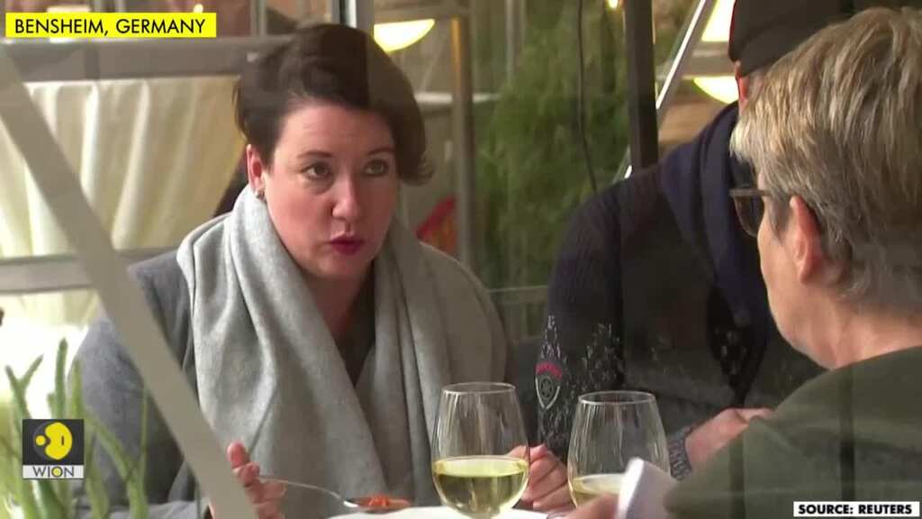 German restaurant fights coronavirus crisis with sheepskins, heated glass booths