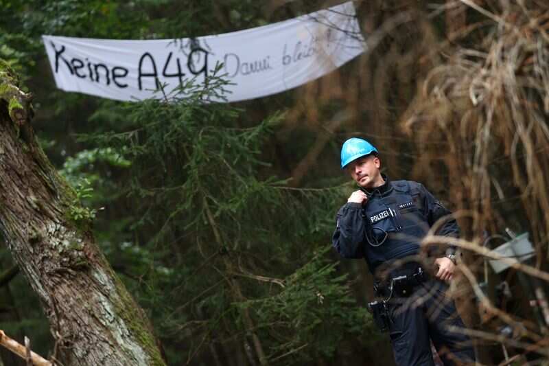 Germany: Activists sleep in tree-houses to stop felling of trees to build motorway