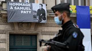 France teacher attack: Samuel Paty's killer had 'contact' with jihadist in Syria