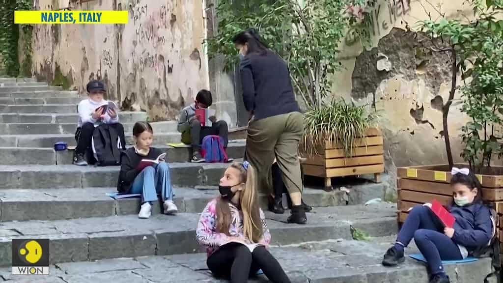 Naples teachers bring socially distanced school to streets and balconies