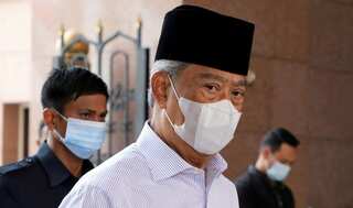 Malaysia's PM Muhyiddin gets reprieve from key ally in political crisis