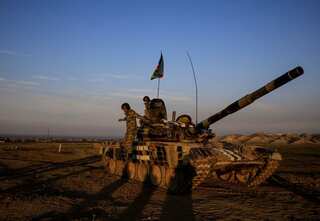 Azerbaijan troops enter first district ceded by Armenia