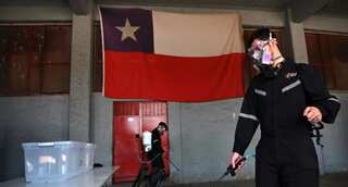 Polls open in Chile on whether to rewrite dictatorship-era constitution