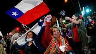 Chileans vote in massive numbers to replace dictatorship-era constitution