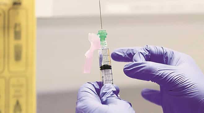 Singapore temporarily halts use of two flu vaccines after South Korea deaths