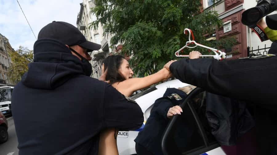 Ukraine activist in nude protest against Polish abortion ban Ukraine activist in nude protest against Polish abortion ban