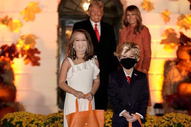 Children dress as Trump, his wife at White House Halloween event Children dress as Trump, his wife at White House Halloween event