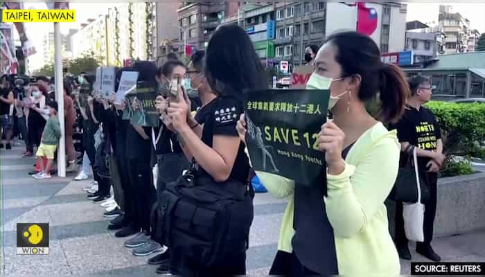 Hundreds rally in Taiwan, call for release of 12 HK people arrested by China