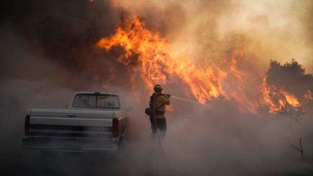 Southern California wildfires prompt mass evacuations, two firefighters injured