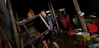 21 dead, dozens missing in Vietnam after typhoon brings destruction